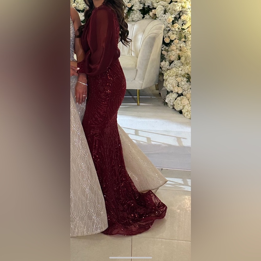 Burgundy/ dark red floor length formal gown.